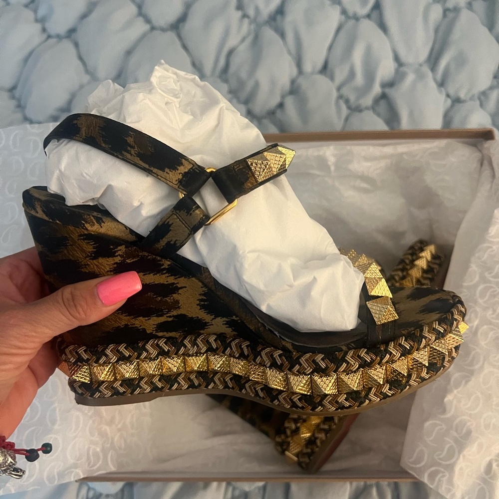 Christian Louboutin Black and Gold Wedges